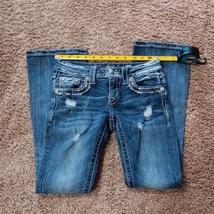 Women's Distressed Blue Jeans